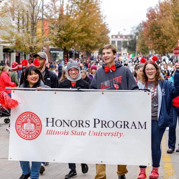 Honors Students walk in the Labor Day parade.