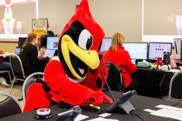 Reggie Redbird calling to thank our donors and alumni for giving back!